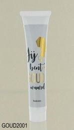  A white hand cream tube with a yellow cap and the text "You are worth gold" printed on it. The product is categorized as Skin Care Tools.