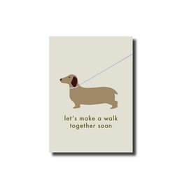  Postcard with a dachshund dog illustration and the text "let's make a walk together soon". The postcard is designed for friendship and encourages the recipient to go for a walk together.