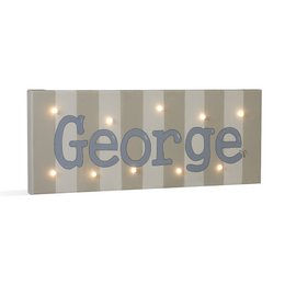 A white and beige LED light canvas with the name "George" displayed prominently. The canvas has a striped pattern and is designed for use in a child's bedroom or nursery as a night light.