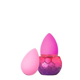 A set of two pink and purple makeup sponges with a unique hexagonal shape, designed for flawless makeup application.