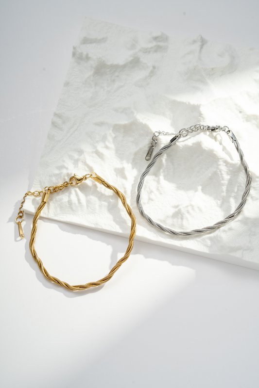 Gouden en zilver gedraaid touwtouw roestvrij staal chic