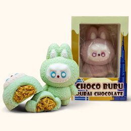 Soft, plush chocolate bar with cute bunny design. Features pink and green colors, round shape, and adorable facial features.