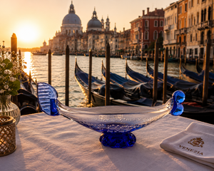 Murano glass gondola, a sculpture created by the best masters of Murano, a symbol of elegance and tradition.