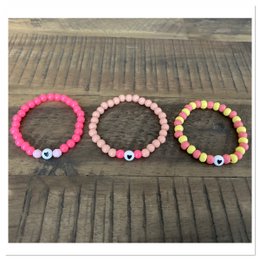 Three colorful beaded bracelets in pink, brown, and multicolored designs. Suitable for children ages 3-12 years old.