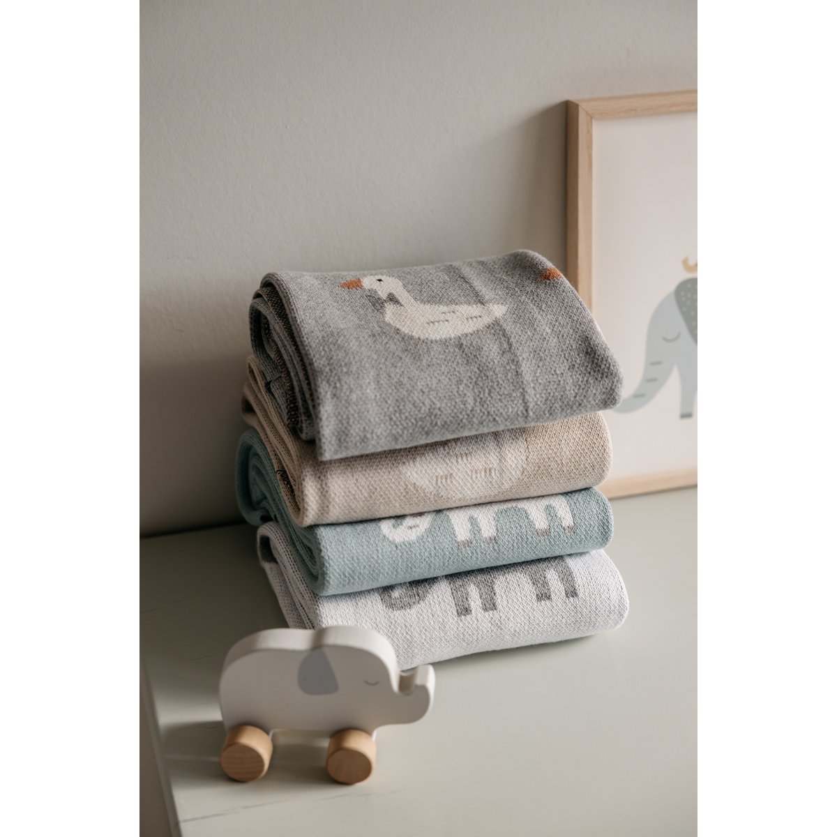 Gebreide katoenen babydeken, beige ganzen