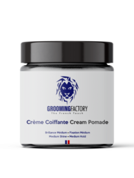 Men's hair styling cream in a black jar with a blue lion logo. Creamy, smooth texture for styling and shaping hair.