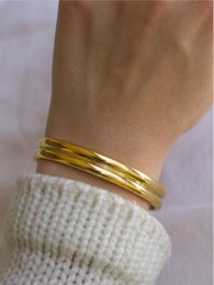 Gil - Bracciale a polsino largo lucido Oro