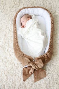 Samt-Babynest mit Schleife (7 Farben)