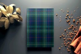Dark blue and green plaid pattern notebook, available in A5 and A6 sizes.
