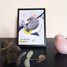Pangolin poster featuring a stylized illustration of a pangolin with geometric shapes and patterns. The poster has a modern, minimalist design.