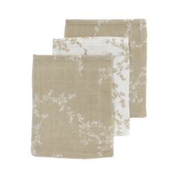 Soft, absorbent baby bath towels in a neutral sand color with a delicate floral pattern. Available in various sizes and multi-packs for versatile use.