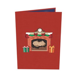 Kerstman in de open haard pop-upkaart