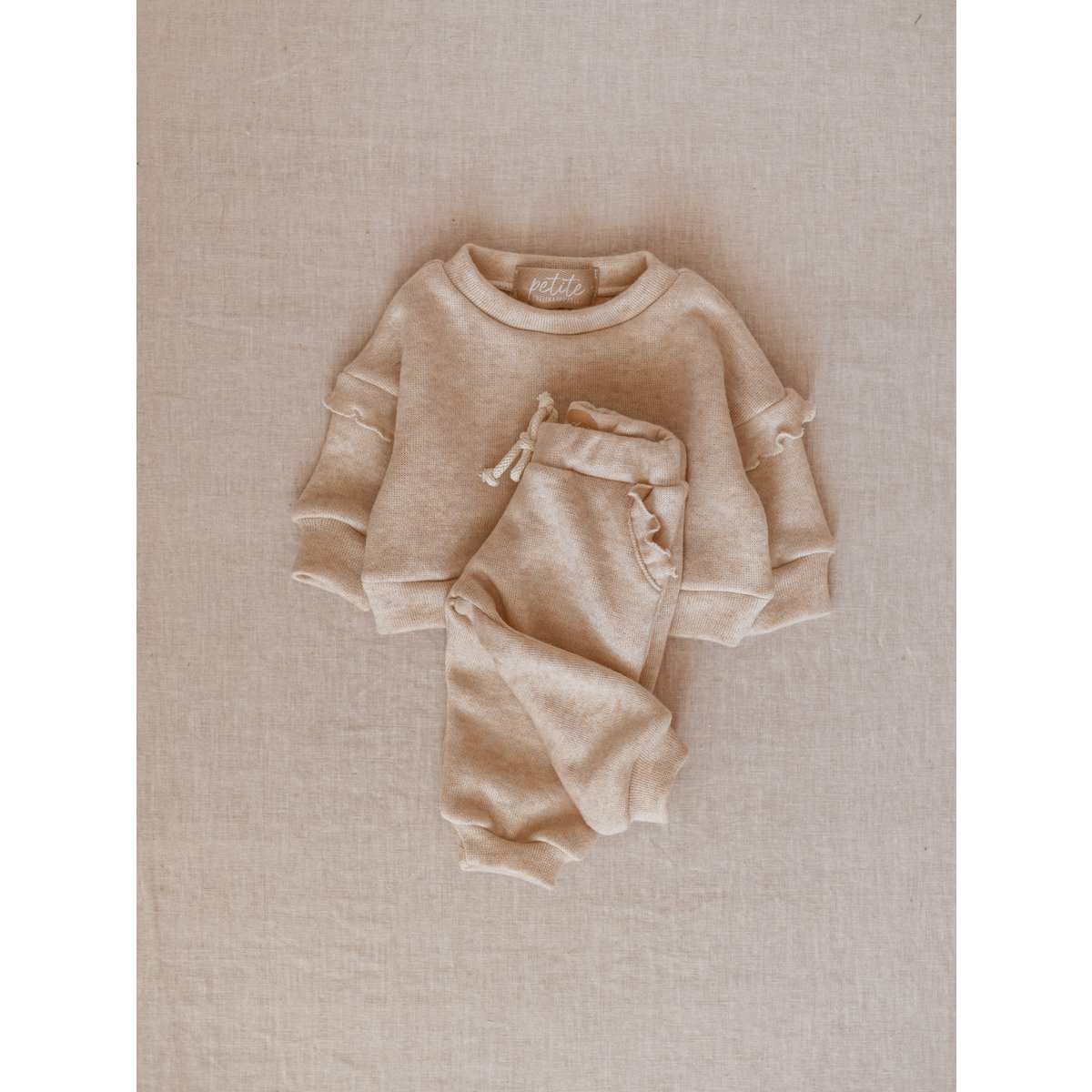 Pantaloni sportivi / volant da ragazza - Crema
