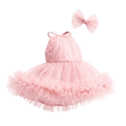 A pink hooded plush jumpsuit with a belt, perfect for a mountain stroll. The outfit includes a matching hat.