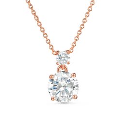 Elegant rose gold necklace with a sparkling diamond-like pendant.