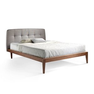Bed upholstered in fabric with Walnut wood frame