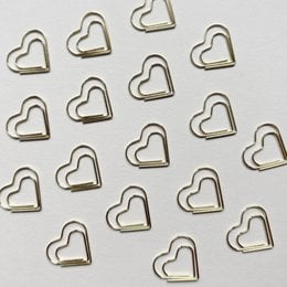 Gold metal paper clips in a teardrop shape. Pack of 10 clips.