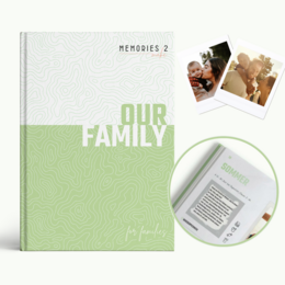"Challenge book for families - a hardcover book with the title 'Our Family' and images of a family on the cover."
The image shows a hardcover book titled "Our Family" with a green and white cover design. The book appears to be part of a series called "Memories 2". The cover features several small photos of a family, suggesting this book is a photo album or memory book focused on a family.
