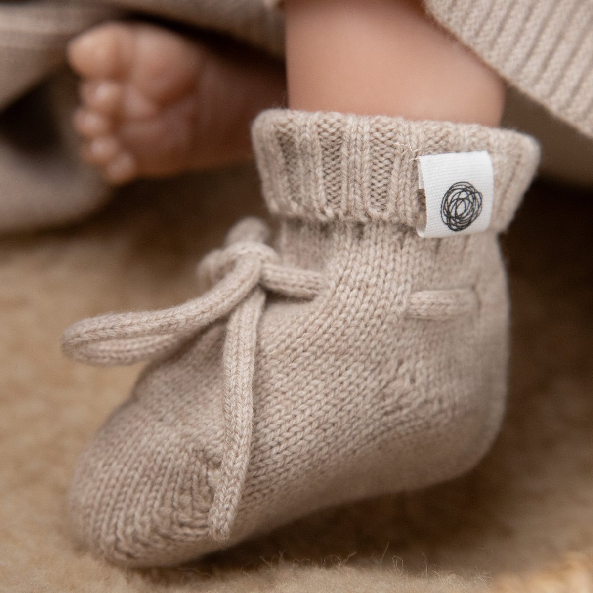 Babysocken aus Wolle / Neugeborenensocken - Merinowolle - Knoblauch