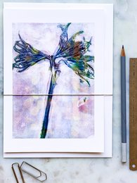  Vibrant watercolor painting of a blue and purple dragonfly with intricate details. Suitable for cards, prints, or home decor.