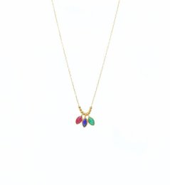 Colorful rice grain charm necklace in red, blue, green, and multi-color variants.