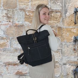 Domelo waxed canvas backpack. Water-repellent unisex backpack. Vegan leisure backpack. Monochrome roll-top backpack design with plenty of space.