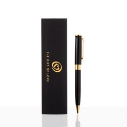 Black ballpoint pen with gold accents, packaged in a black box.