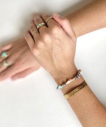 Armbånd med orange ferskvandsperler
