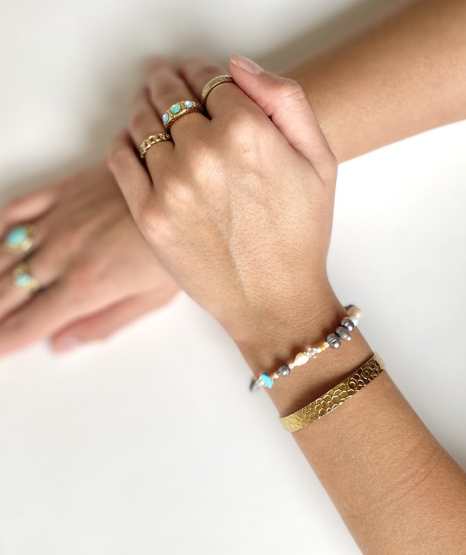 Armbånd med orange ferskvandsperler