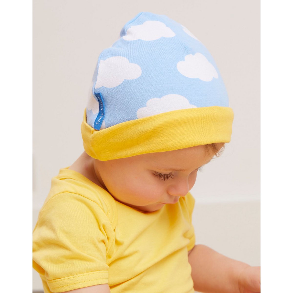 Organic cotton baby gift set with romper, hat and body with sun cloud pressure