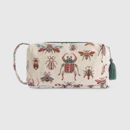 Rectangular toiletry bag with colorful insect print, including beetles, ladybugs, and other bugs. Bag has a tassel zipper pull and a strap for carrying.