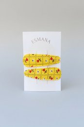 Moschettone da bambino giallo con fiorellini