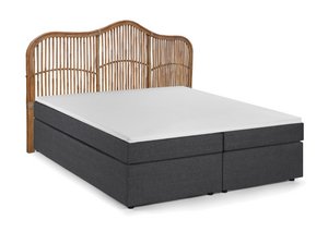Box spring bed with rattan headboard