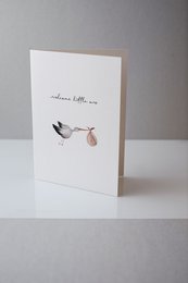 Folding card with stork and text "Welcome little one" in neutral colors, suitable for baby announcements or congratulations.