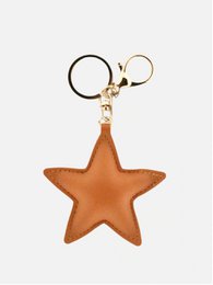 Twinkle Tan Star Borse Charm