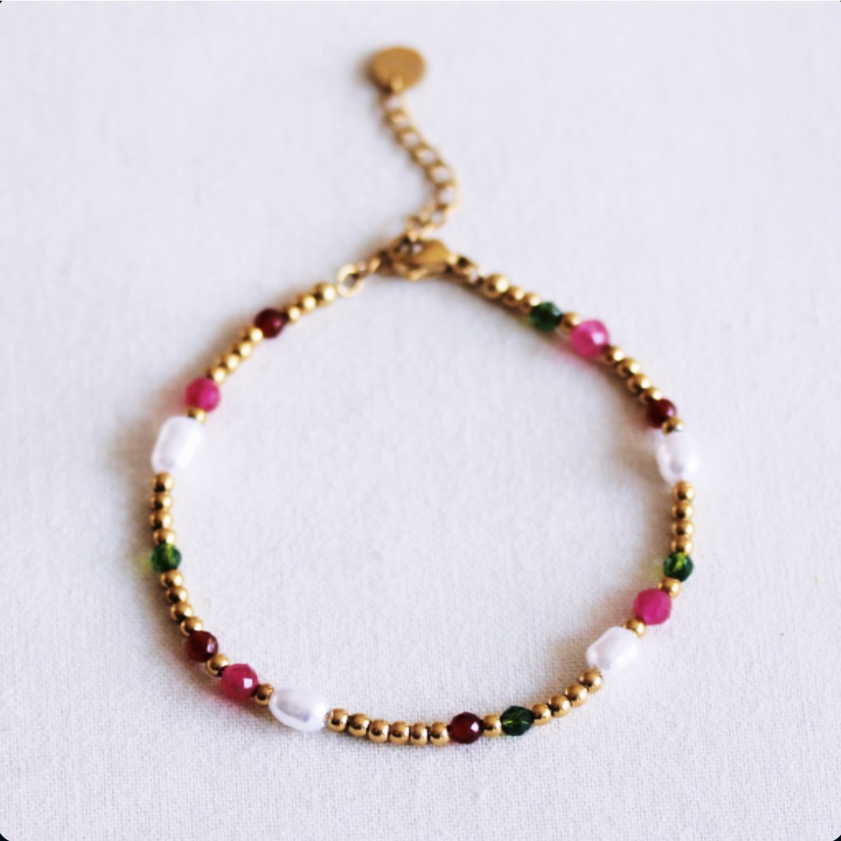 Kralenketting met parels en facetten - groen/fuchsia/rood