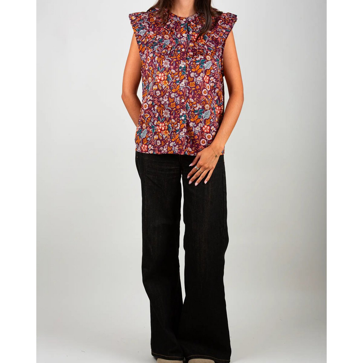 Blusa de mujer morris sin mangas con volantes