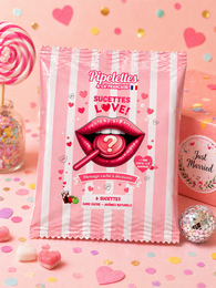 Box of personalized “LOVE” themed lollipops