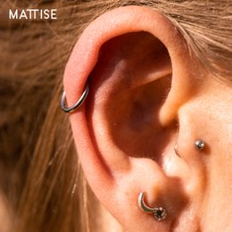 Silver surgical steel ring piercing suitable for helix, tragus, septum, lip, nose, and eyebrow piercings. Available in 6mm, 8mm, 10mm, and 12mm diameters with 1.0mm or 1.2mm thickness.