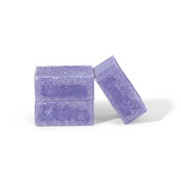 Lavender-colored amber block with a rectangular shape and a smooth, uniform texture. Suitable for use in aromatherapy or as a decorative accent.
