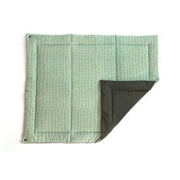 Botanical green playpen rug with soft, textured surface and portable design for easy transport and use.