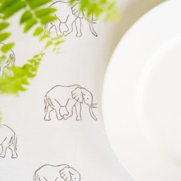 Grey elephant-patterned tablecloth, rectangular and round shapes, suitable for dining or decorative use.
