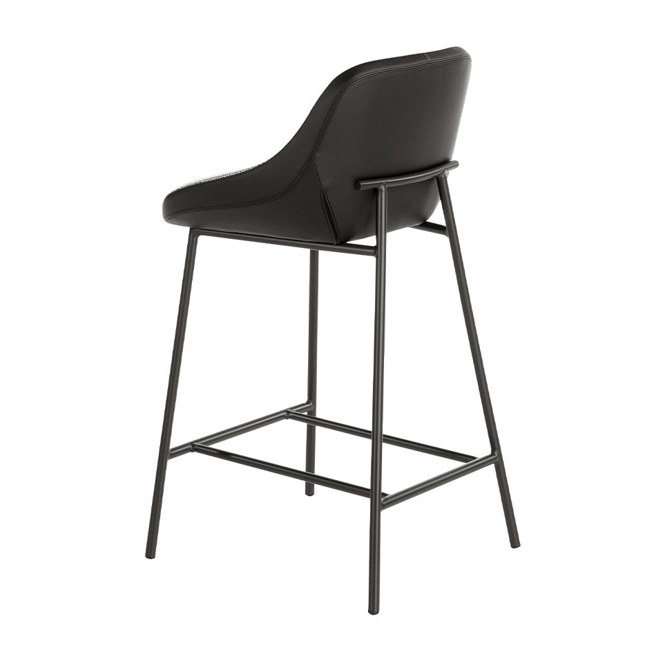 Stool upholstered in fabric and leatherette