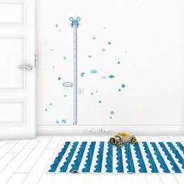 Blue and white patterned wall decal with a ruler design, suitable for a child's room.