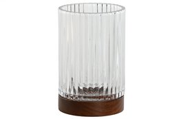  A tall, cylindrical glass container with vertical ridges and a wooden base. Suitable for use as a toothbrush holder or decorative accent.