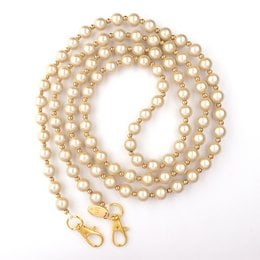 Beige small 10mm pearl necklace with gold-tone clasp and chain.