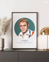 "Poster featuring a portrait of a man with curly hair and a French flag. The poster is titled 'THE INTREPID' and is available in green, blue, and gray color variants."