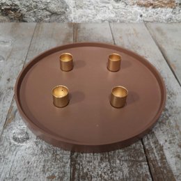 Copper advent candle holder with 4 gold-colored candle holders on a round brown base.