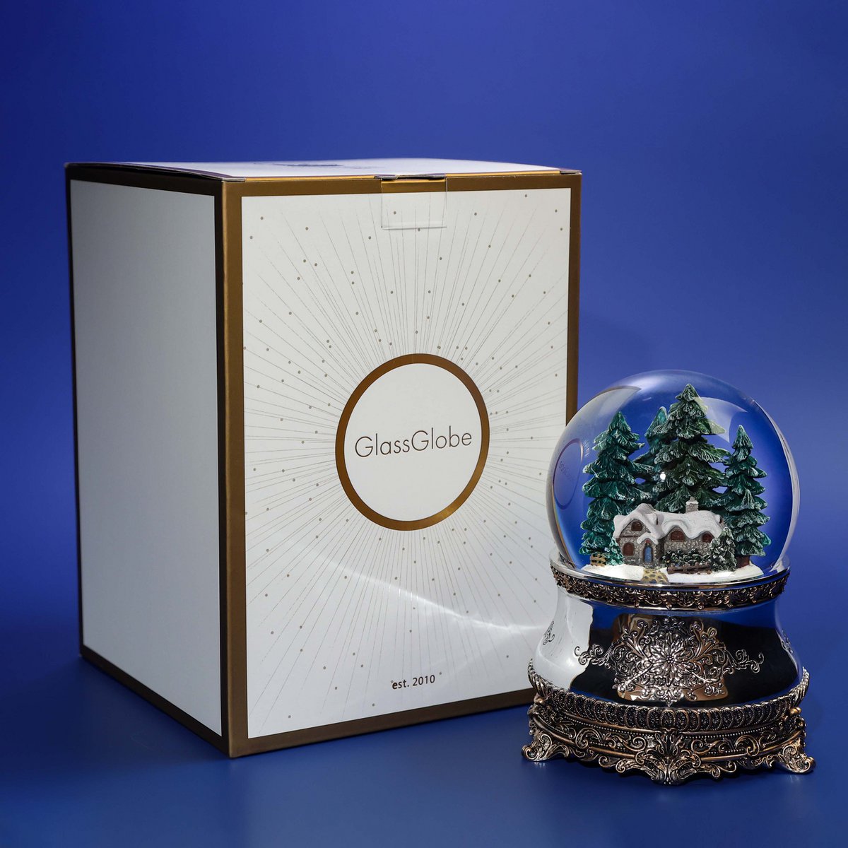 Kerstmuzikale sneeuwbol “Jachthuis”, glas, met verlichting en automatische sneeuwstorm