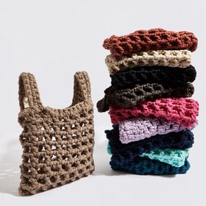 “Thalia” crochet wrist bag beige